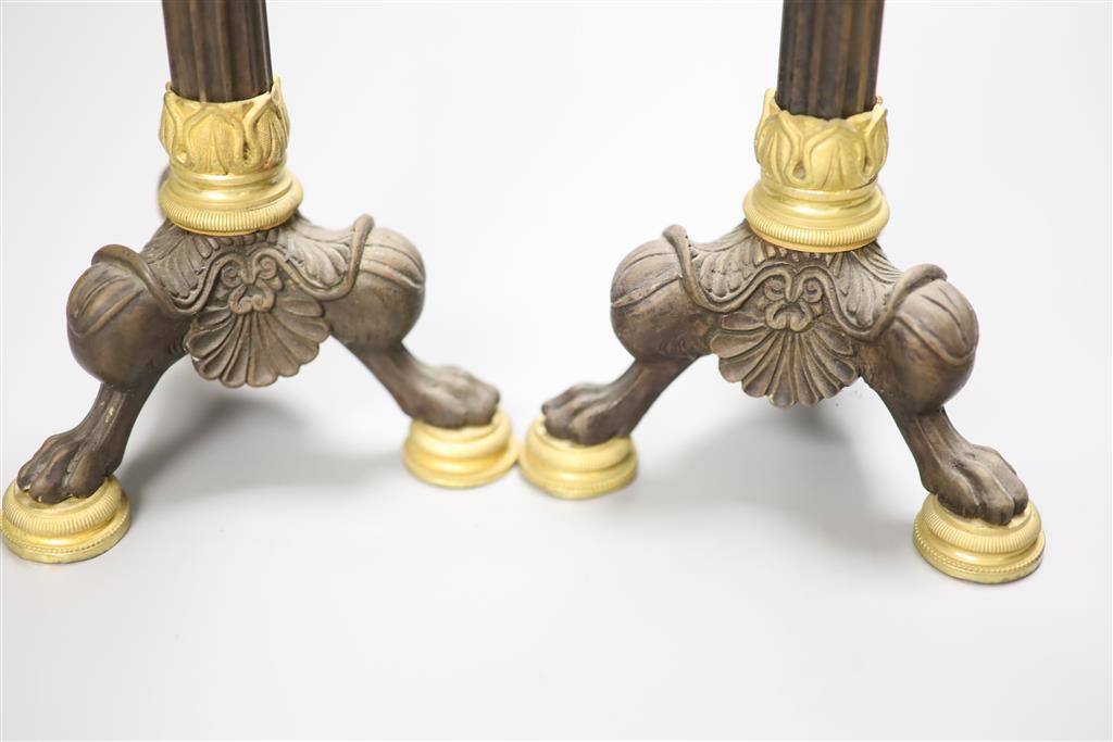 A pair of 19th century French bronze and ormolu mounted candlesticks height 27.9cm (2)